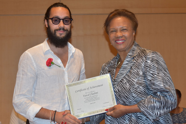 Cambridge Community Learning Center 2016 graduate Faical Chadimi with Cambridge Mayor E. Denise Simmons